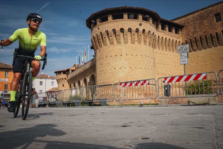 Cyclist going on a rented bike in Ceriva during Ironman Event in Emilia Romagna